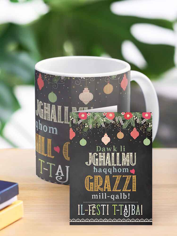 Mug tal-Milied għall-Għalliema fuq sfond iswed bit-tiżjin